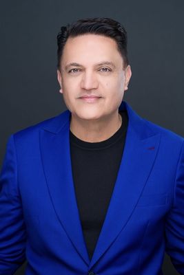 Portrait of Romi Sarna, Associate.